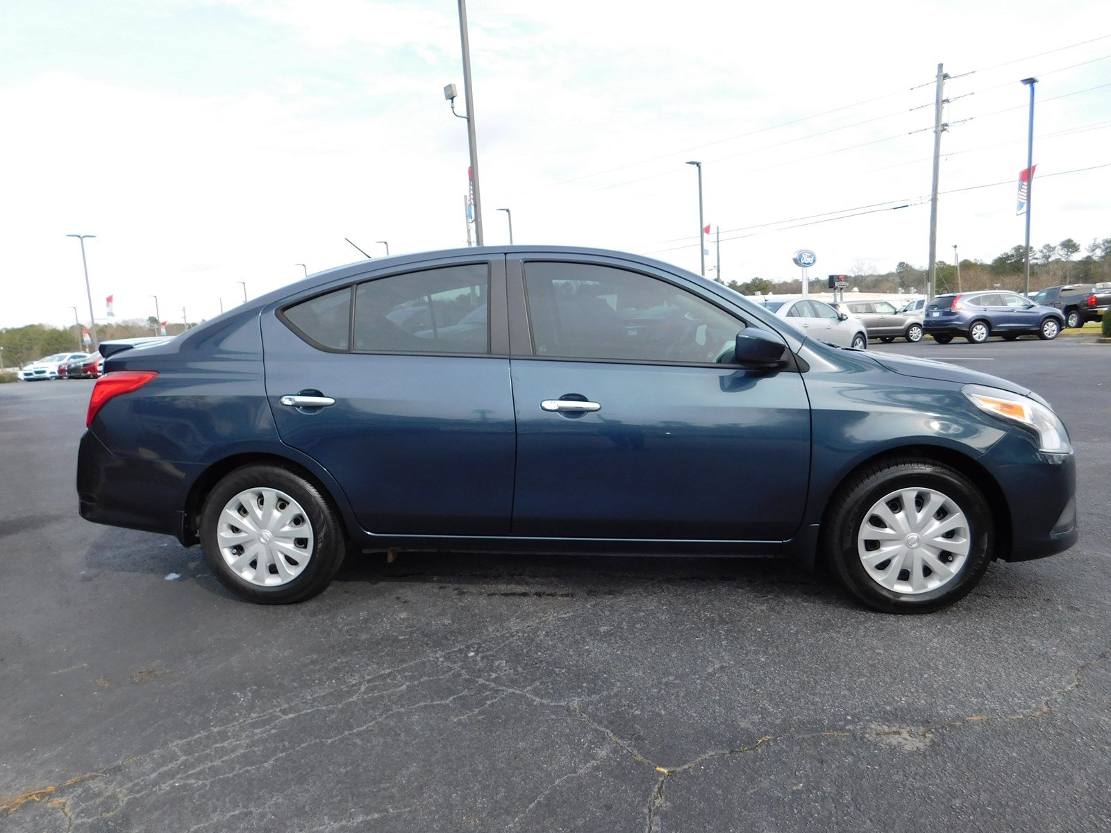 Pre-Owned 2015 Nissan Versa SV 4dr Car in Macon #028005A | Butler Auto ...